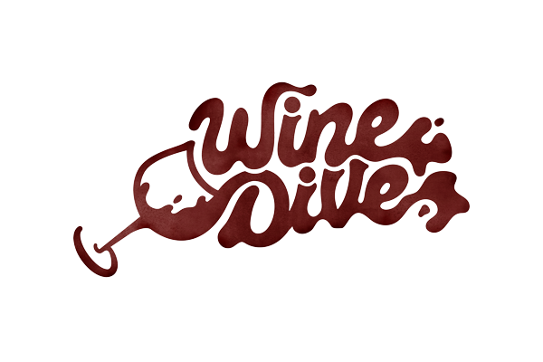 Stylized text reads “Wine Dives” in dark red, with the first letter “W” forming the shape of a tipped wine glass spilling wine, merging the liquid into the rest of the lettering on a light background.